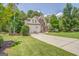 Charming two-story home with a stone facade and a well-manicured lawn at 119 Creekside Vw, Hiram, GA 30141