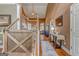 Grand foyer with hardwood floors, high ceilings, and a decorative staircase at 119 Creekside Vw, Hiram, GA 30141