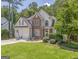 Charming two-story home with a stone facade and a well-manicured lawn at 119 Creekside Vw, Hiram, GA 30141