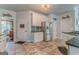 Bright kitchen with stainless steel appliances and tile flooring at 119 Creekside Vw, Hiram, GA 30141