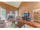 Inviting living room featuring stone fireplace, hardwood floors, and neutral decor at 119 Creekside Vw, Hiram, GA 30141