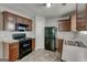 A well-equipped kitchen featuring stainless steel appliances and abundant cabinet space at 2898 Cedar Trace Dr, Ellenwood, GA 30294