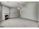 Spacious living room with fireplace and neutral carpet and ceiling fan at 2898 Cedar Trace Dr, Ellenwood, GA 30294