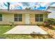 Back of house with patio at 2898 Cedar Trace Dr, Ellenwood, GA 30294