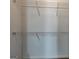 This walk-in closet offers metal shelving, white walls and neutral carpet flooring for storage and organization at 2898 Cedar Trace Dr, Ellenwood, GA 30294