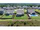 Aerial view showing the backyard with a screened porch and fence at 4160 Grandview Vista St, Cumming, GA 30028