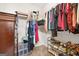 Walk-in closet with extensive shelving and storage for clothing, shoes, and accessories at 4160 Grandview Vista St, Cumming, GA 30028