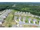 Aerial view of the residential neighborhood with lush greenery and well-maintained homes at 4160 Grandview Vista St, Cumming, GA 30028