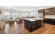 Spacious kitchen with a large island, stainless steel appliances, and open layout to the living area at 4160 Grandview Vista St, Cumming, GA 30028