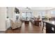 Comfortable living room with a fireplace, hardwood floors, and plenty of natural light at 4160 Grandview Vista St, Cumming, GA 30028