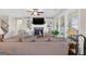 Comfortable living room features a fireplace, built-in shelving, and cozy seating at 4160 Grandview Vista St, Cumming, GA 30028