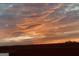 Striking sunset view with fiery orange hues painting the sky above the horizon at 4160 Grandview Vista St, Cumming, GA 30028
