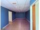 Spacious basement with tile floor and ample room for storage at 133 Magazine St, Dallas, GA 30157