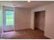 Bedroom with carpet flooring and natural light and a walk in closet at 133 Magazine St, Dallas, GA 30157