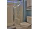 Bathroom with a glass door shower, tiled floors and updated fixtures at 183 Eagles Club Dr, Stockbridge, GA 30281