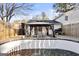 Poolside patio with an outdoor dining set; great for entertaining and relaxation by the pool at 916 Marshall Fuller Rd, Dallas, GA 30157