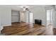 Bright bedroom with ceiling fan and modern floors at 1048 Falls Brooke Dr, Conyers, GA 30094