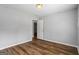 This spacious bedroom features neutral walls and updated flooring at 1048 Falls Brooke Dr, Conyers, GA 30094