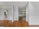 Bright entryway featuring hardwood floors and neutral paint, creating a welcoming and spacious atmosphere at 1048 Falls Brooke Dr, Conyers, GA 30094