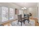 Dining room with chandelier and access to outdoor living space at 10775 Brunson Dr, Johns Creek, GA 30097
