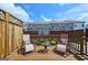 Outdoor deck offering a cozy area with seating, overlooking the backyard at 4107 Township Pkwy # 69, Sandy Springs, GA 30342