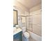 Cozy bathroom with sliding shower doors, a vanity with a modern faucet, and neutral decor at 4107 Township Pkwy # 69, Sandy Springs, GA 30342