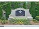The Townes at Chastain sign surrounded by manicured landscaping at 4107 Township Pkwy # 69, Sandy Springs, GA 30342