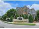 Townes at Chastain community entrance with landscaping and monument at 4107 Township Pkwy # 69, Sandy Springs, GA 30342