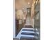 Welcoming foyer showcasing modern design, sleek staircase, and an open-concept layout flowing into dining area at 4107 Township Pkwy # 69, Sandy Springs, GA 30342