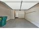 Spacious two car garage with neutral paint, utility closet and coated floor at 4107 Township Pkwy # 69, Sandy Springs, GA 30342