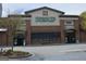 Front exterior of a Sprouts Farmers Market grocery store with ample parking and nearby conveniences at 4107 Township Pkwy # 69, Sandy Springs, GA 30342