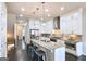Bright, open kitchen featuring stainless steel appliances, granite countertops, and a central island with seating at 4107 Township Pkwy # 69, Sandy Springs, GA 30342