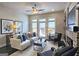 Comfortable living room featuring modern decor, a fireplace, and plenty of natural light at 4107 Township Pkwy # 69, Sandy Springs, GA 30342