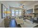 Inviting living room with fireplace, large windows, and stylish furnishings at 4107 Township Pkwy # 69, Sandy Springs, GA 30342