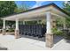 Organized, covered mailboxes with brick and white columns offer convenient service for residents at 4107 Township Pkwy # 69, Sandy Springs, GA 30342