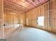 Large unfinished basement with exterior door and a window offering natural light at 5342 Legacy Trl # 30, Douglasville, GA 30135