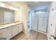 Bathroom features a double sink vanity and large glass-enclosed shower at 5342 Legacy Trl # 30, Douglasville, GA 30135