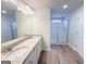 Bathroom features a double sink vanity and large glass-enclosed shower at 5342 Legacy Trl # 30, Douglasville, GA 30135
