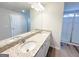 Bathroom features a double sink vanity and large glass-enclosed shower at 5342 Legacy Trl # 30, Douglasville, GA 30135