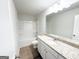 Bathroom with a vanity, a single sink, modern wood flooring, and a shower-tub combo at 5342 Legacy Trl # 30, Douglasville, GA 30135