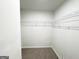 Walk-in closet with wire shelving for optimized storage at 5342 Legacy Trl # 30, Douglasville, GA 30135