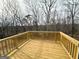 New wooden deck overlooks wooded backyard and offers a great outdoor space at 5342 Legacy Trl # 30, Douglasville, GA 30135