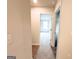 Hallway with carpeted floor leading to bedrooms at 5342 Legacy Trl # 30, Douglasville, GA 30135