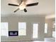 Living room featuring an electric fireplace and access to the outdoor deck at 5342 Legacy Trl # 30, Douglasville, GA 30135