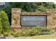 Ashford Park: A Starlight Homes community stone sign surrounded by greenery at 7301 Cranleigh St, Covington, GA 30014