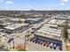 Charming town aerial shot with commercial buildings and quaint streets near mountain, capturing a blend of community and nature at 4178 Castle Pines Ct, Tucker, GA 30084