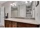 Bathroom with a double sink vanity with granite countertop, large mirror, and shelves in view at 792 Mimosa Se Dr, Marietta, GA 30060