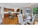 Bright kitchen with stainless steel appliances and a dining area bathed in natural light at 792 Mimosa Se Dr, Marietta, GA 30060