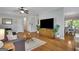 Inviting living room with hardwood floors, open floor plan, and ample natural light at 792 Mimosa Se Dr, Marietta, GA 30060