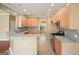 Spacious kitchen featuring granite countertops, stainless steel appliances, and ample wood cabinetry at 412 Middlebrooke St, Canton, GA 30115